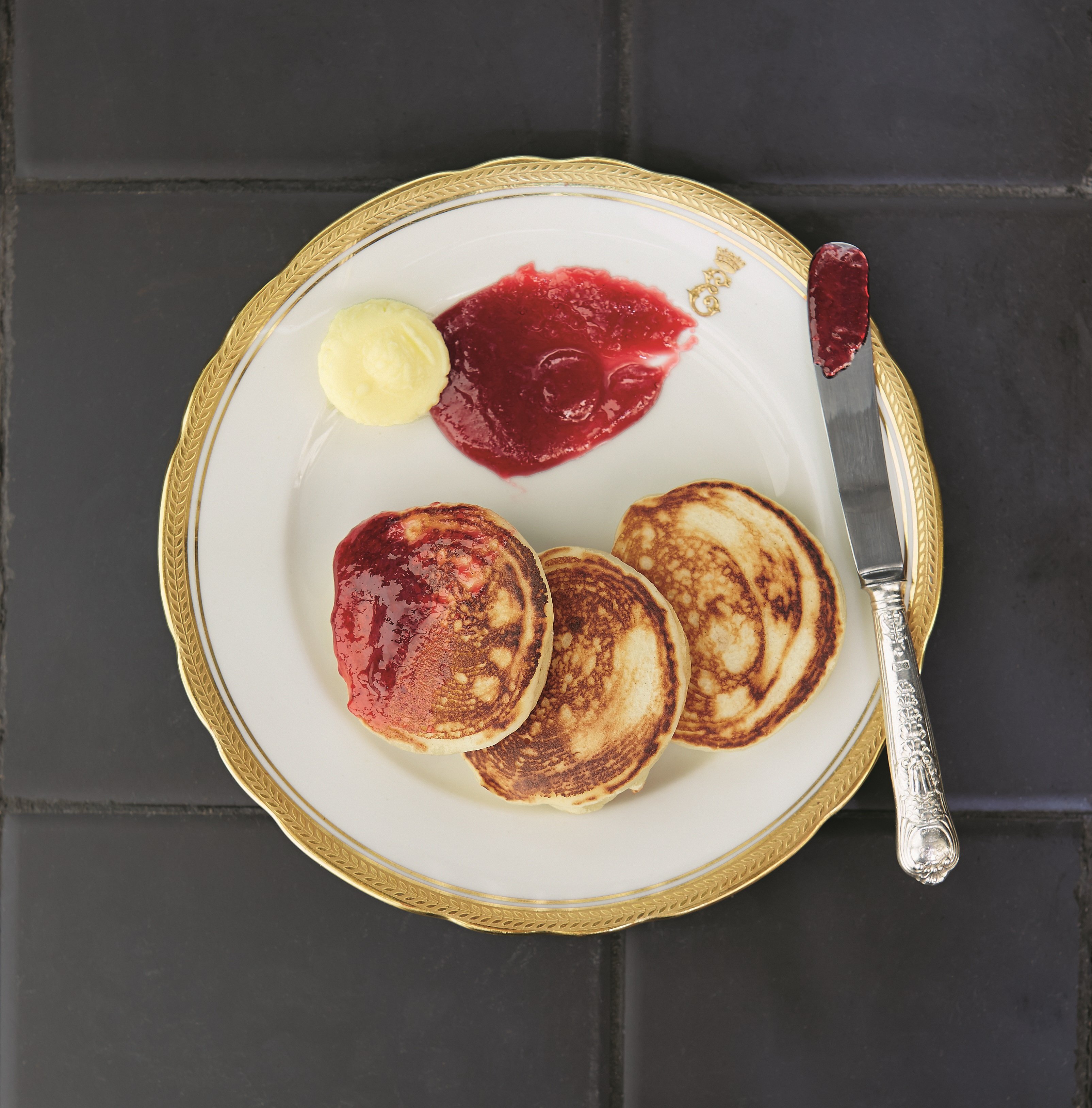 Drop Scone with jam on yellow plate