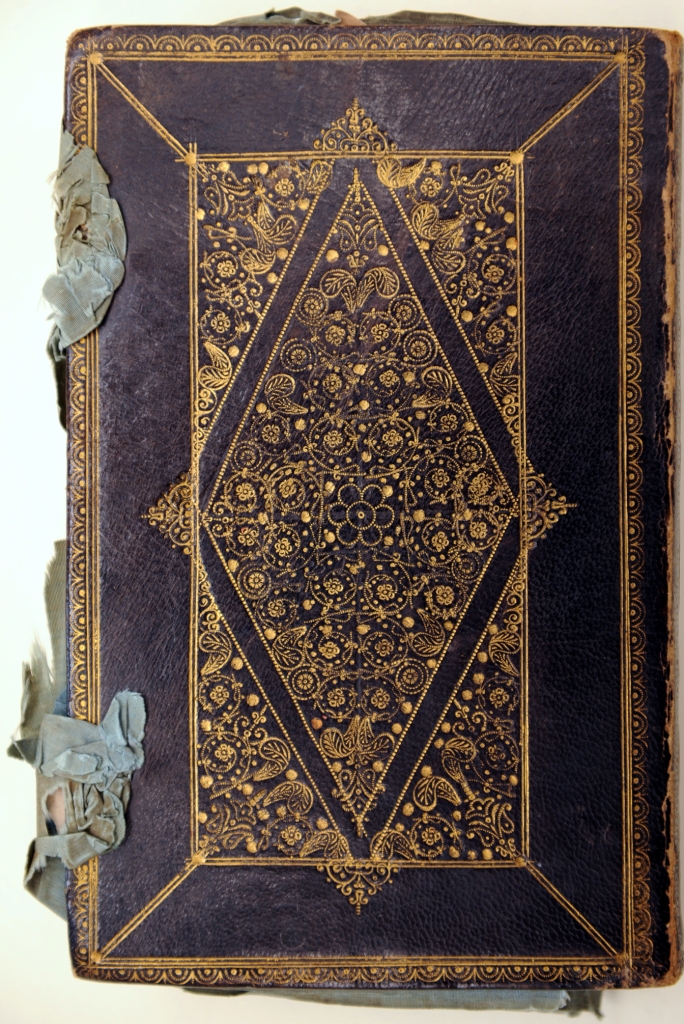 The back board showing high-quality gold tooling