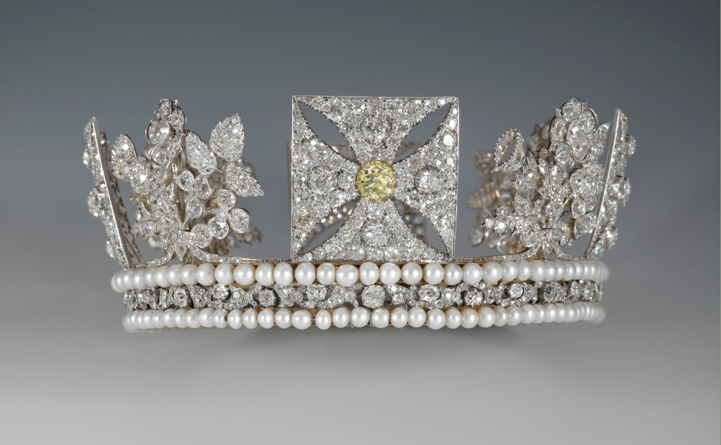 A silver and gold-lined diadem with an openwork frame set transparent with diamonds; narrow band edged with pearls, surmounted by four crosses-patt&eacute;e, the front cross set with a pale yellow brilliant, and four sprays representing the national emble