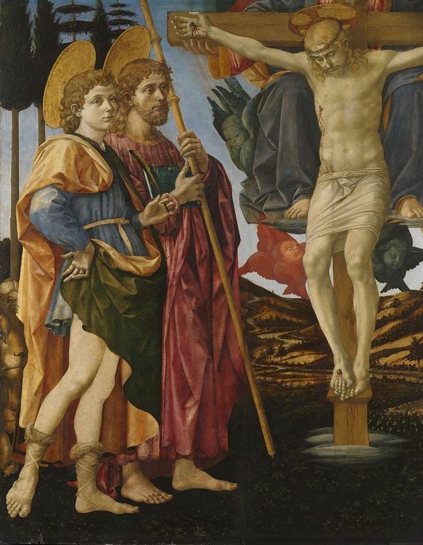 Saints Mamas and James (A fragment) This is a fragment from the left side of the central panel of large altarpiece. It shows two saints at full-length. The nearer figure, Mamas, is a twelve-year old shepherd-boy who is shown in an olive-green robe, lined yellow-ochre, over a blue-grey coat