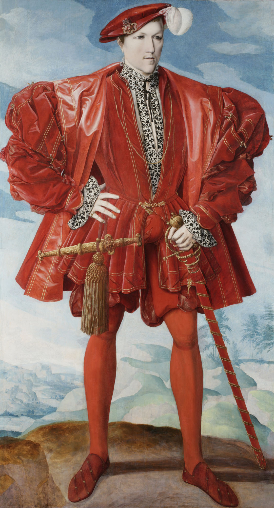 Portrait of a Man in Red This painting is one of the most enigmatic sixteenth century portraits in the Royal Collection. It is a visually arresting image: painted full-length, nearly two metres tall, the man is silhouetted against an apparently imaginary landscape with the sugges