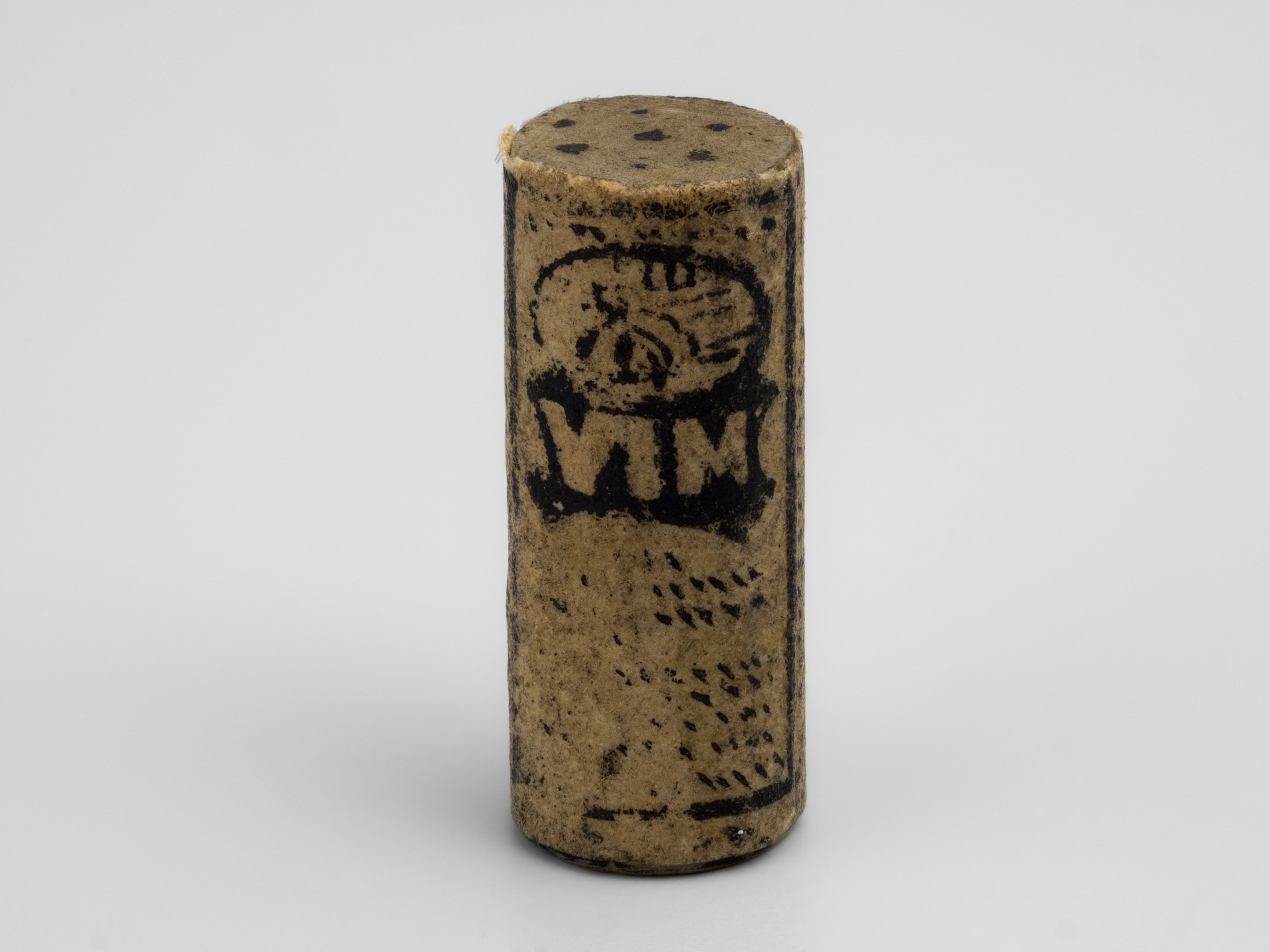 Miniature wooden tube of Vim cleaning product with paper label