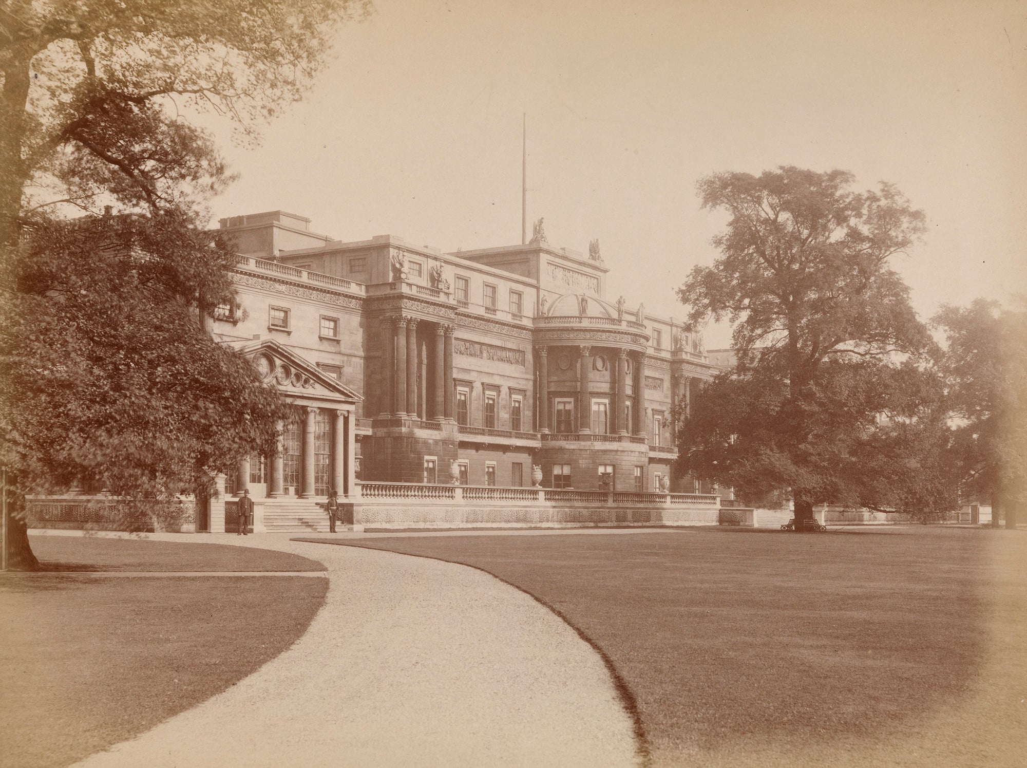 The Garden Front, Buckingham Palace Photograph of the Garden Front at Buckingham Palace with the west facing Palace facade with trees either side