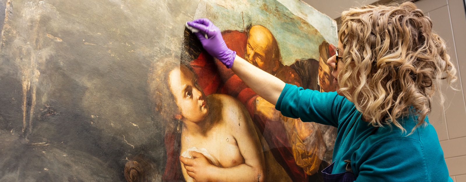 Painting entitled 'Susanna and the Elders' by Artemesia Gentileschi being restored by RCT curator