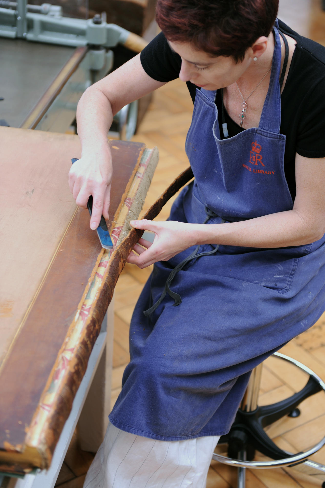 Removing spine leather