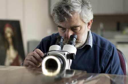 Dendrochronologist Ian Tyers examining tree rings