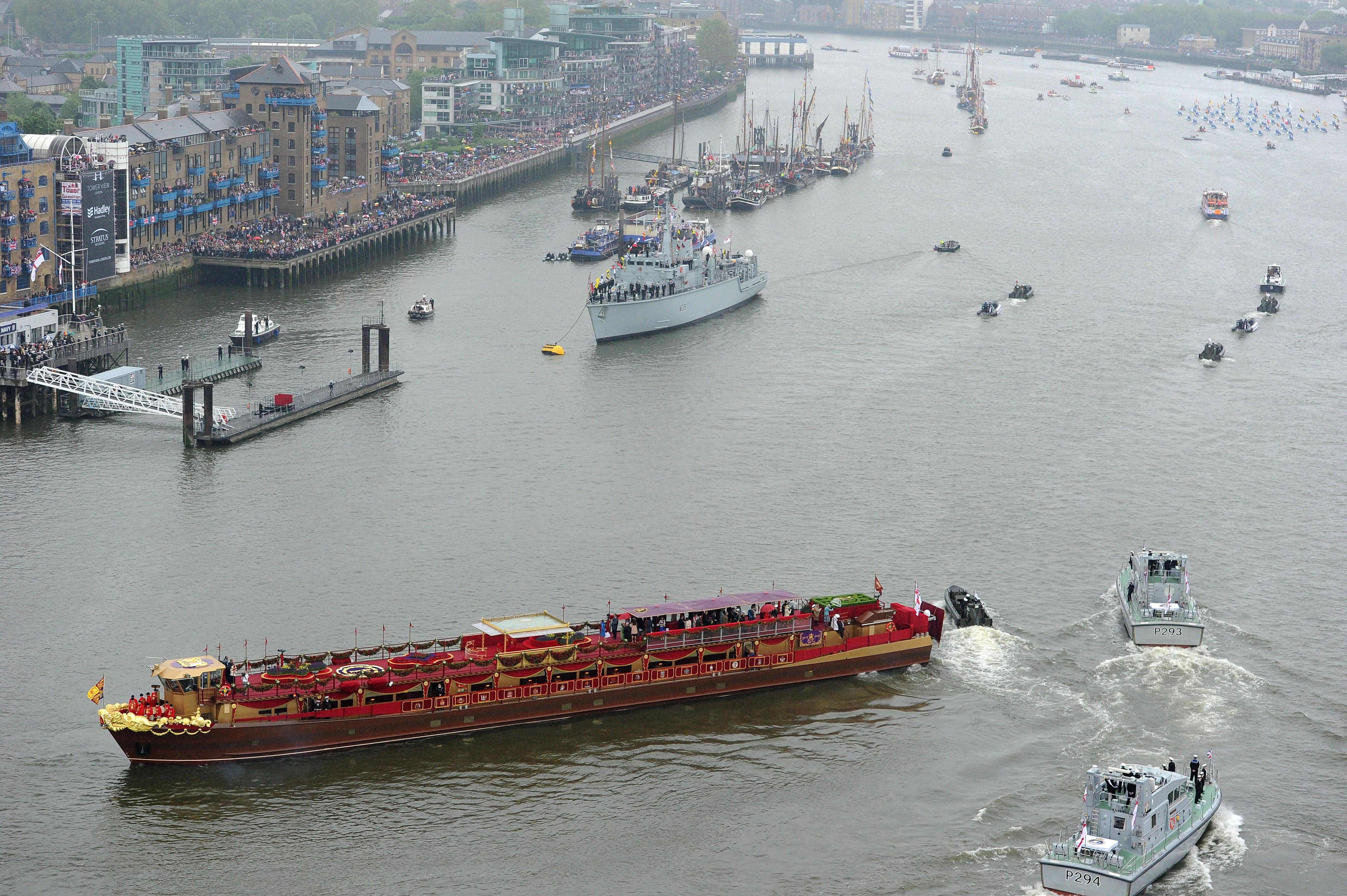 The Royal Barge arrives at Tower Bridge during the Diamond Jubilee River Pageant
