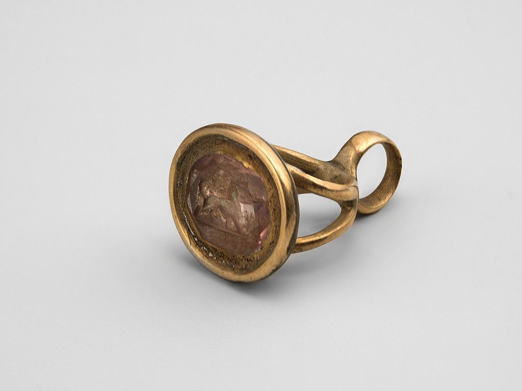 Miniature brass fob seal, set with smoky quartz intaglio of lion passant
