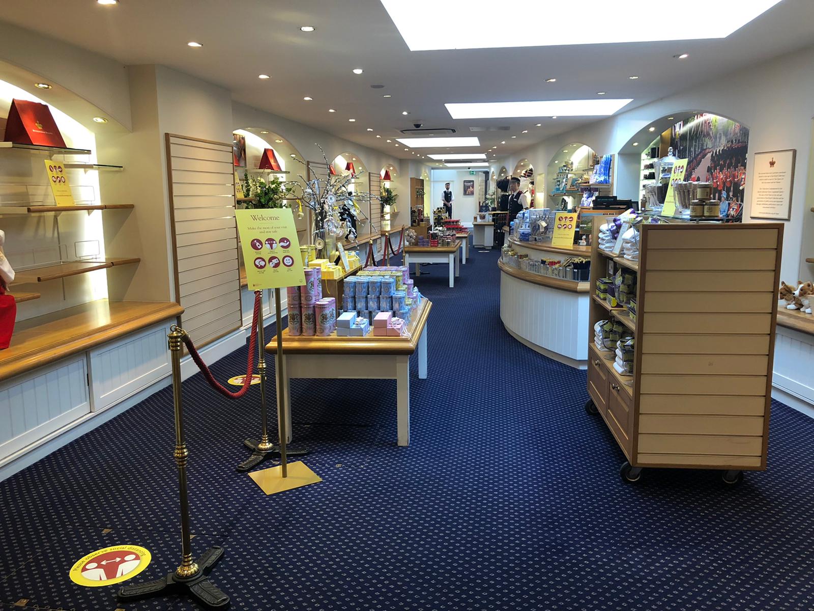 Blue carpet, shelves and merchandise in the shop
