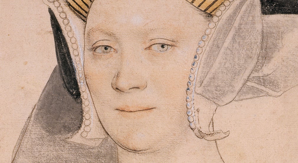 This drawing of Lady Vaux shows how white highlights have been added to give fuller shape to the forehead and nose and around her eyes (RCIN 912247) A drawing of a woman's face looking directly at the viewer. She has blue eyes and a Tudor headdress.