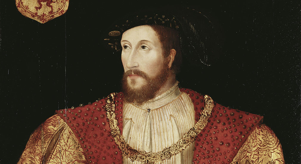 Image of James V of Scotland wearing red and gold clothing and a black hat.