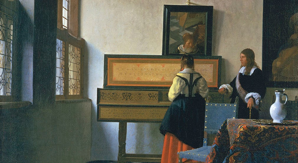 The Music Lesson or Lady at the Virginals with a Gentleman by Johannes Vermeer (RCIN 405346). Painting of a woman facing away from the viewer. She is playing the virginal a keyboard instrument while a man stand next to her. Light comes in from windows on the left.