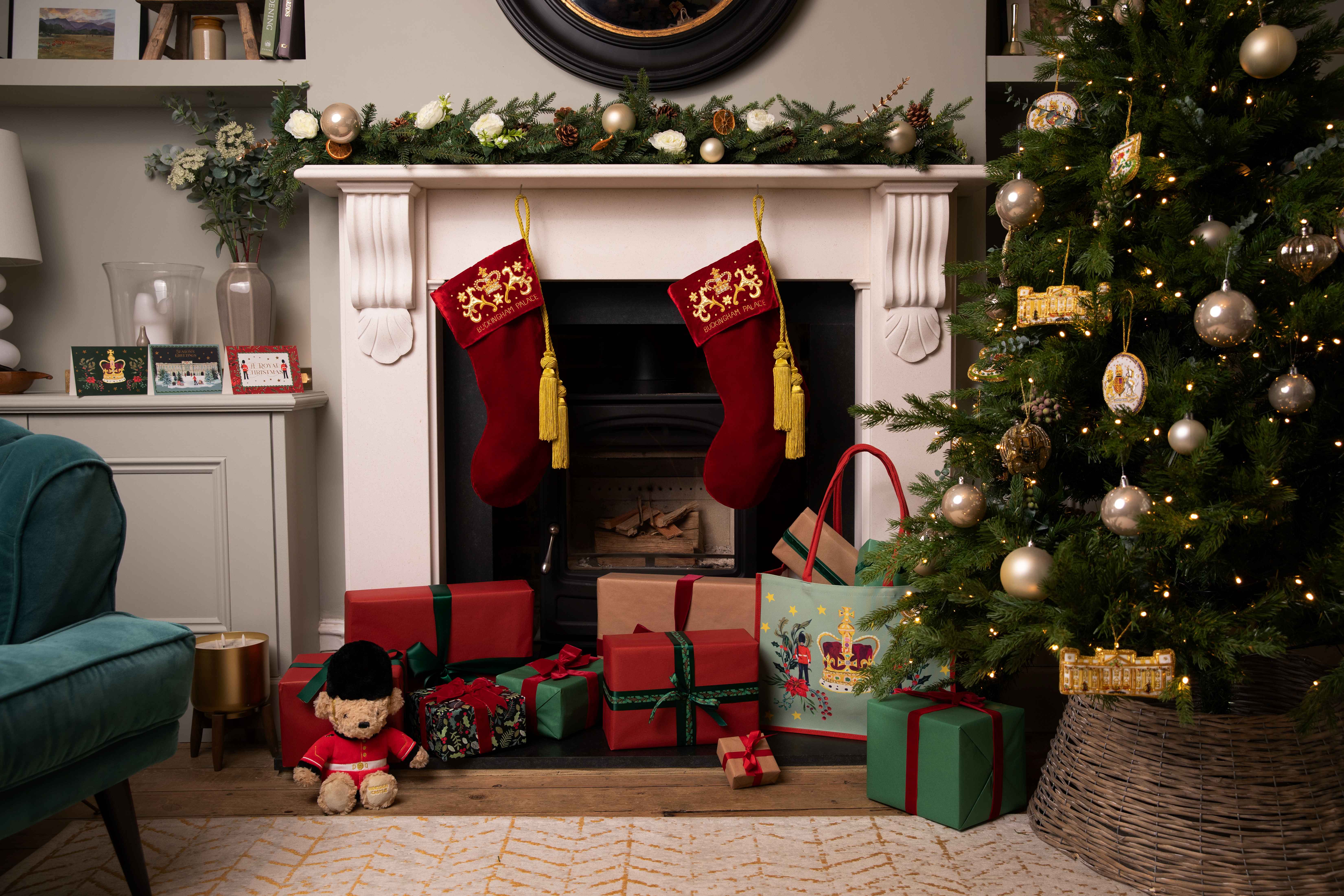 Red Velvet Christmas Stockings hang above a fireplace