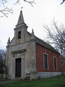 The exterior of the church at Little Gidding, a red brick building