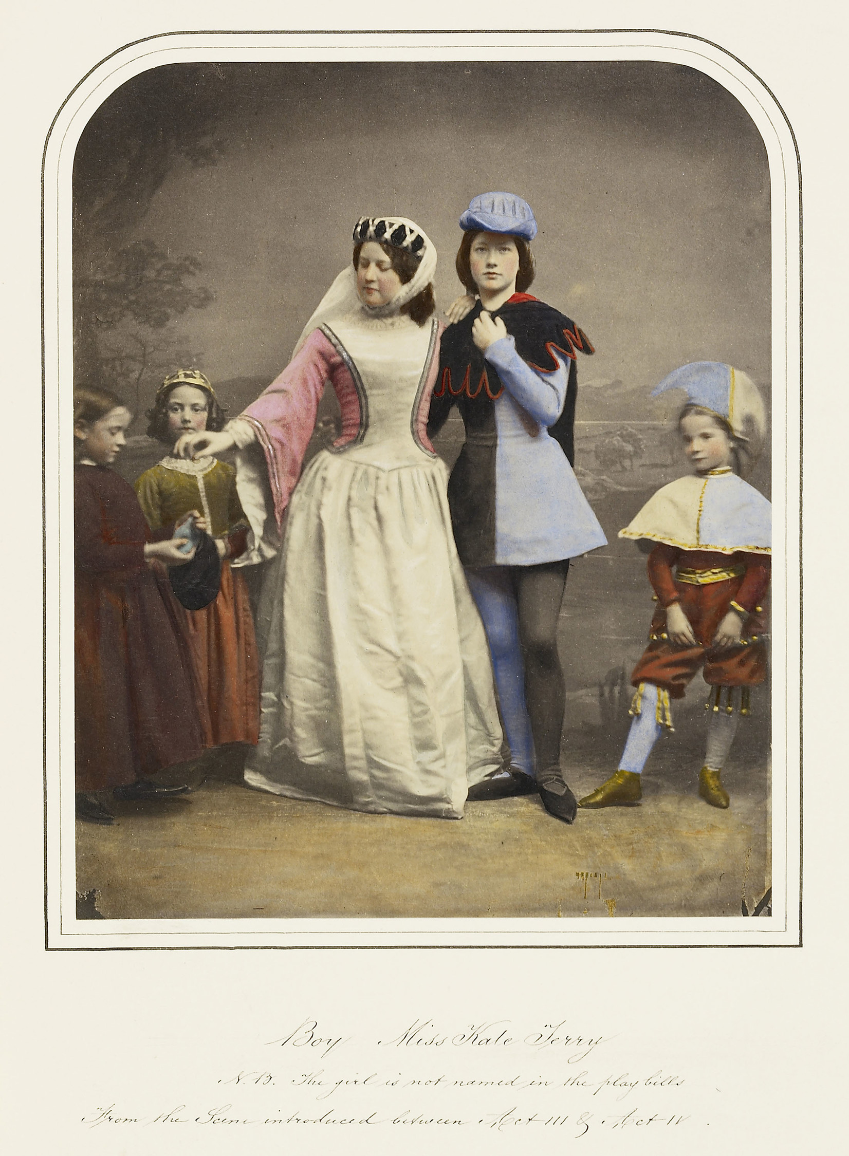 Hand coloured photograph of actress Kate Terry (second from right), as a boy, in a recreation of the 'Historical Episode' of&nbsp;'King Richard II' as performed at the Princess's Theatre, Oxford Street, London.&nbsp;Terry wears a black and light blue shor