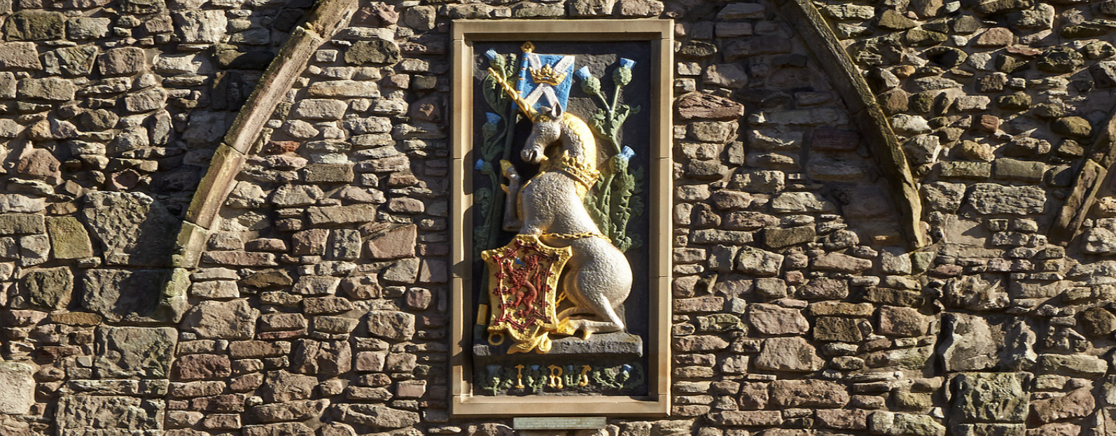 Painted unicorn on a building at the Palace of Holyroodhouse