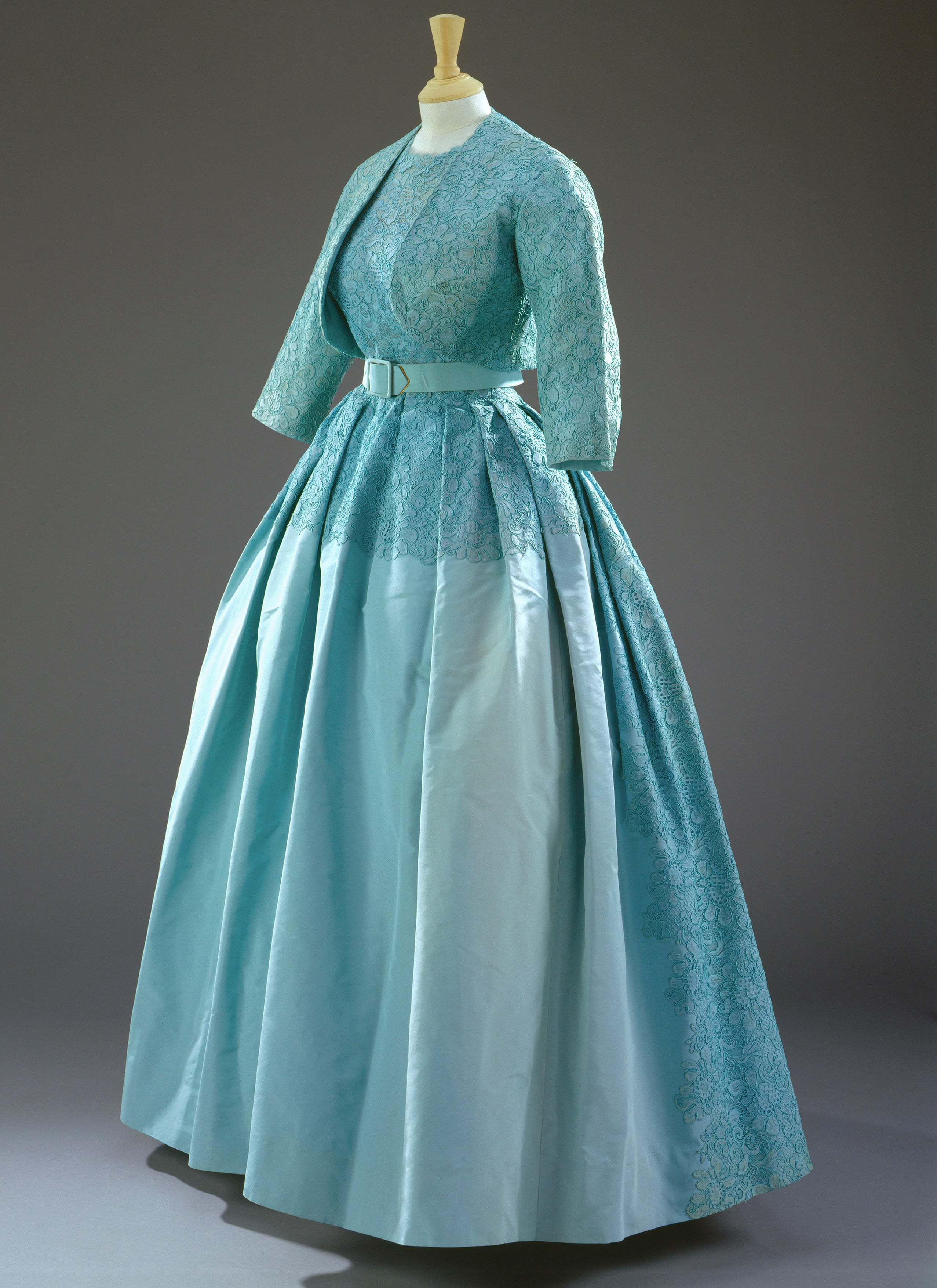 A mid-blue dress with a matching bolero jacket