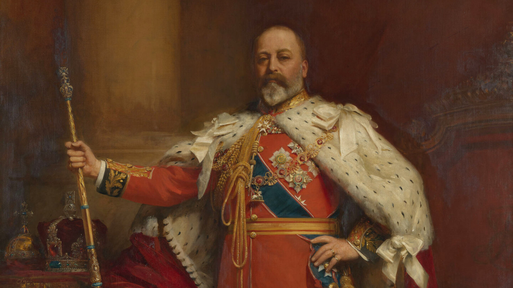 Sir Samuel Luke Fildes, King Edward VII (1841-1910), 1902 (RCIN 404553) The state portrait of King Edward VII commissioned from the artist Sir Luke Fildes in 1901. The King stands, an imposing figure, raised on a dais, holding the Sceptre in his right hand; the Imperial State Crown and the Orb rest on a table on the left.