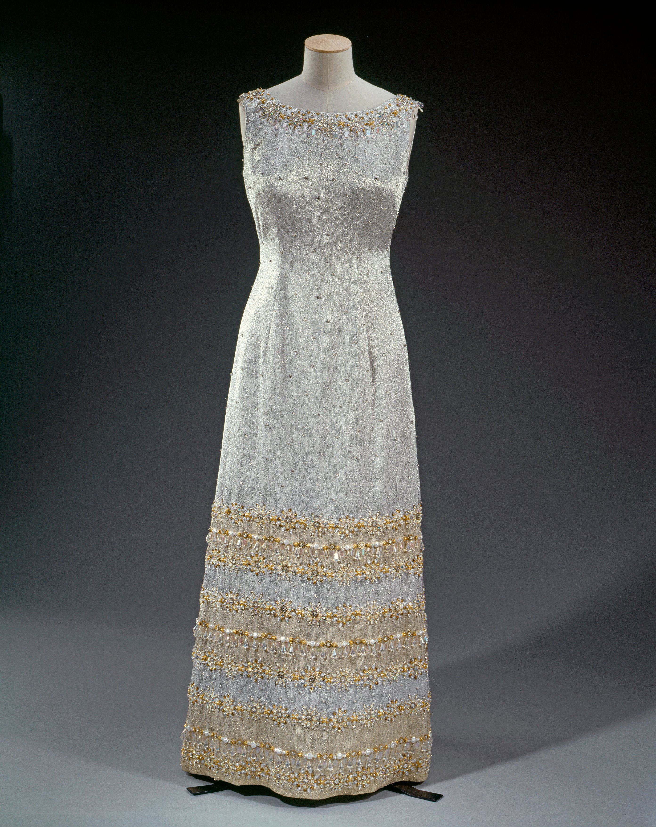 Silver lamé beaded shift dress, Norman Hartnell, 1972. Silver lamé beaded shift dress.