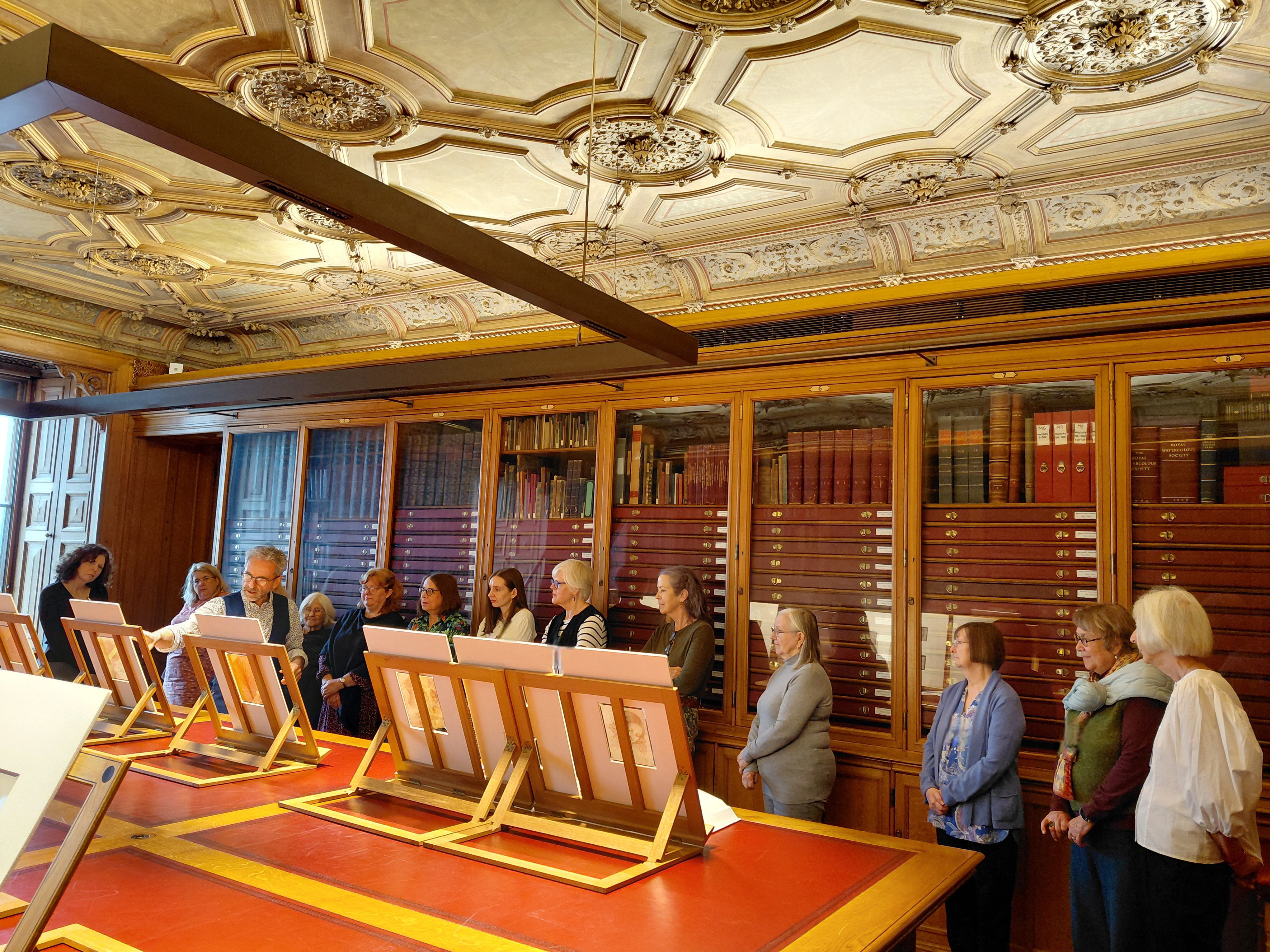 Martin Clayton showing Leonardo drawings to RSN students in The Print Room, Windsor Castle