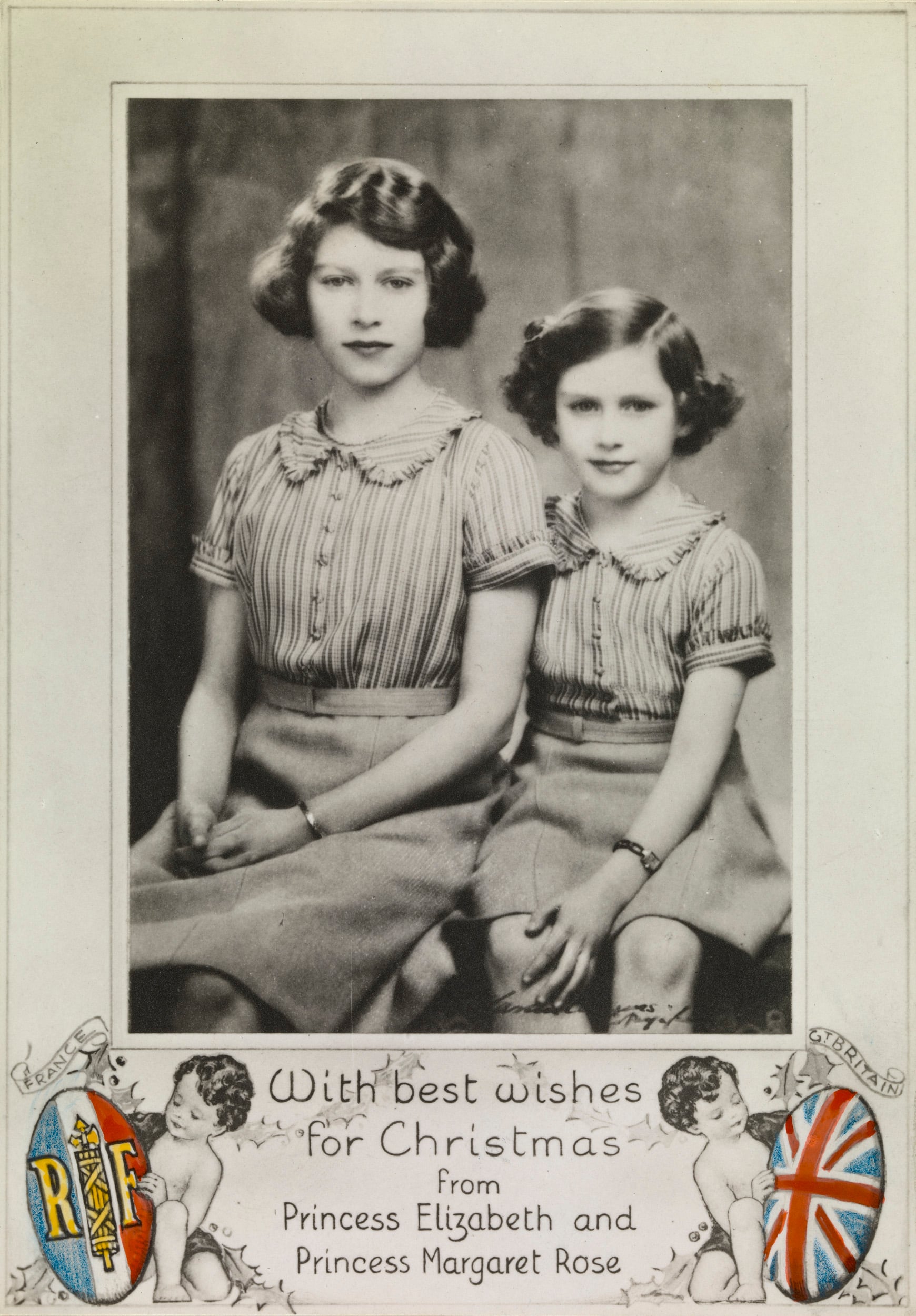 Portrait photograph of Princess Elizabeth and Princess Margaret as a Christmas card, c. 1939 (RCIN 2108383) Black and white photograph of two girls with handwritten Christmas messge