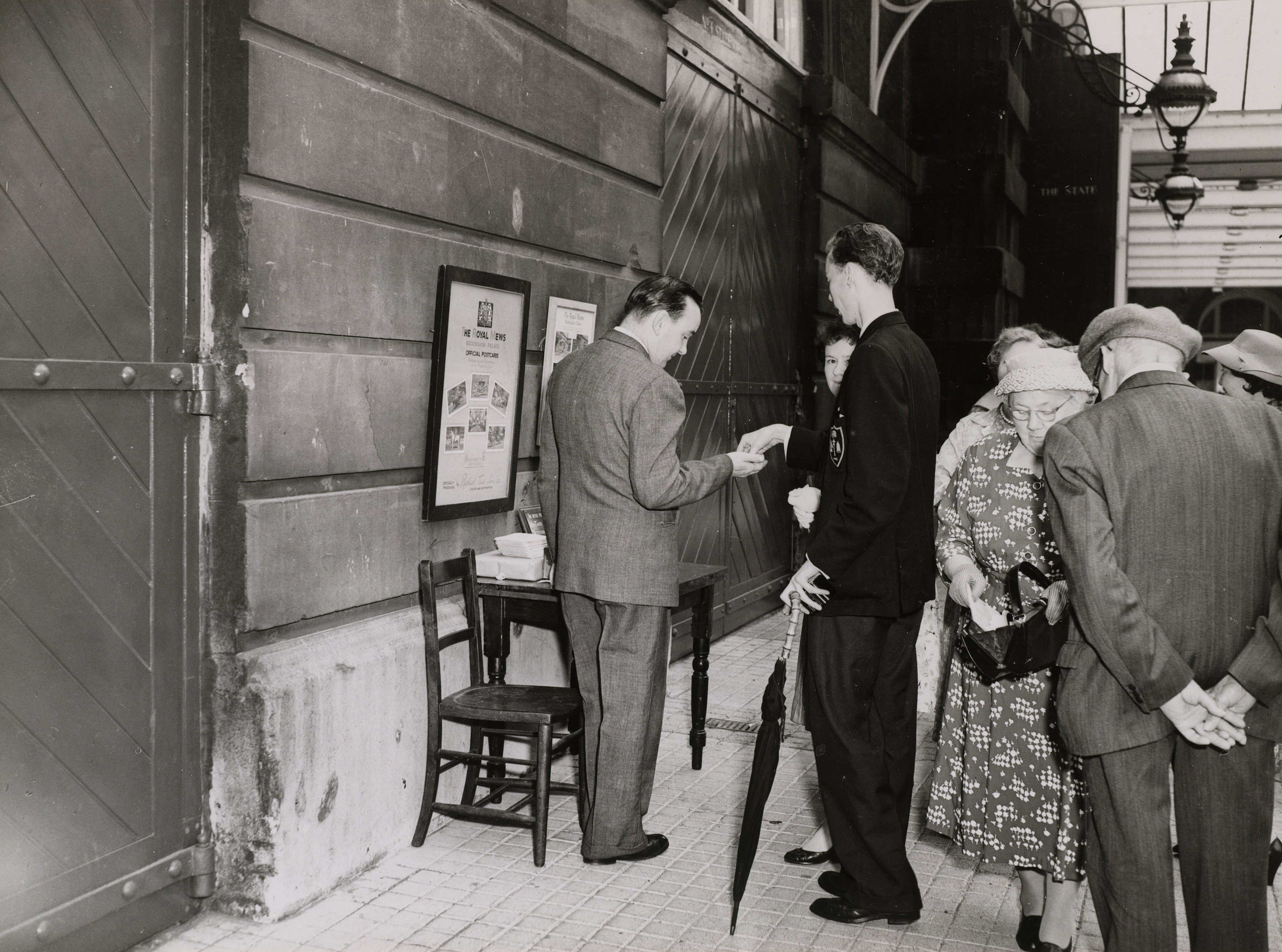 Photographs showing visitors buying tickets and touring the Royal Mews around the time of the Coronation of Queen Elizabeth II.