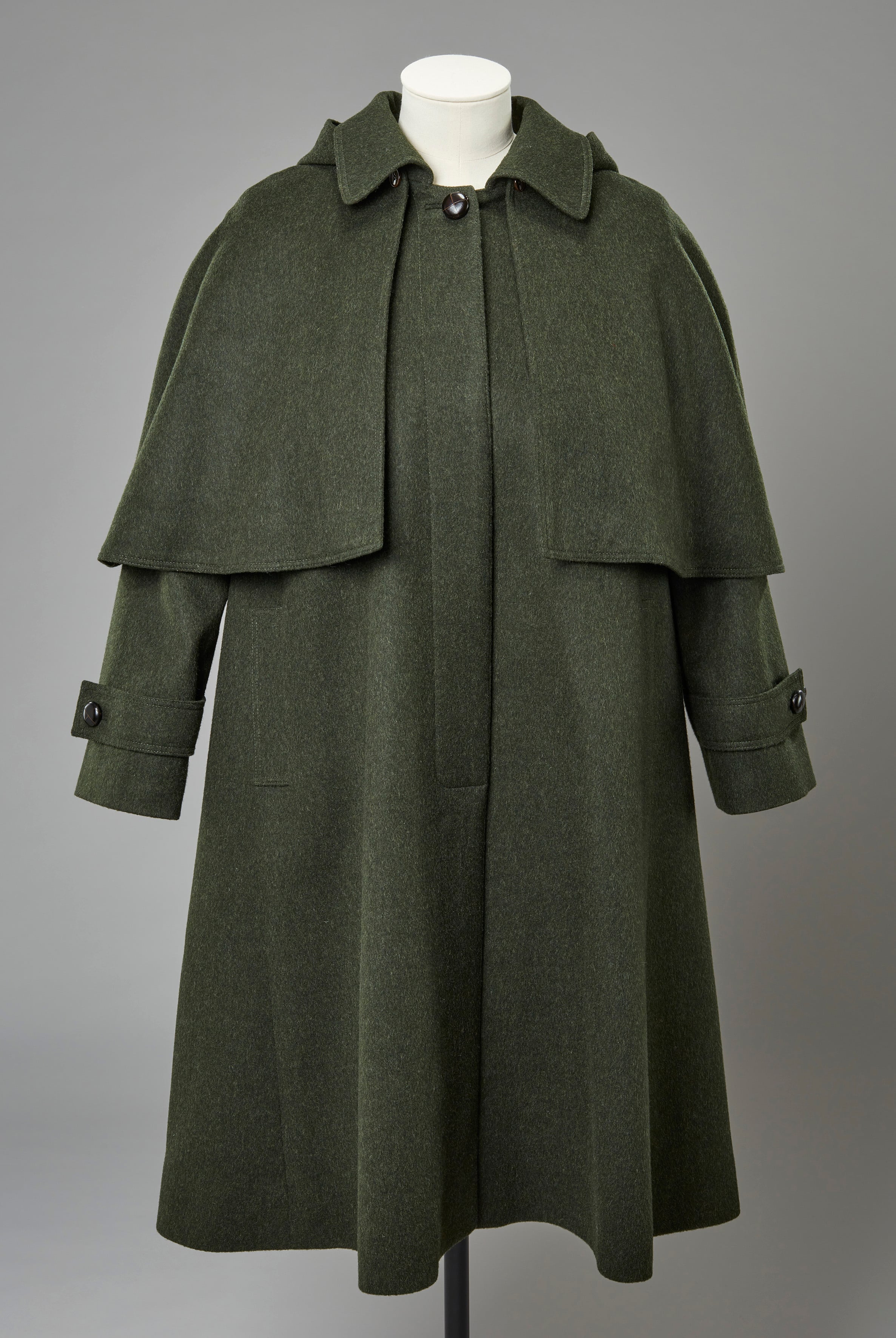 Coat, Angela Kelly, 2010s. Credit: © Royal Collection Enterprises Limited 2026 | Royal Collection Trust. Photographer: Jon Stokes. A green tweed coat by Angela Kelly.