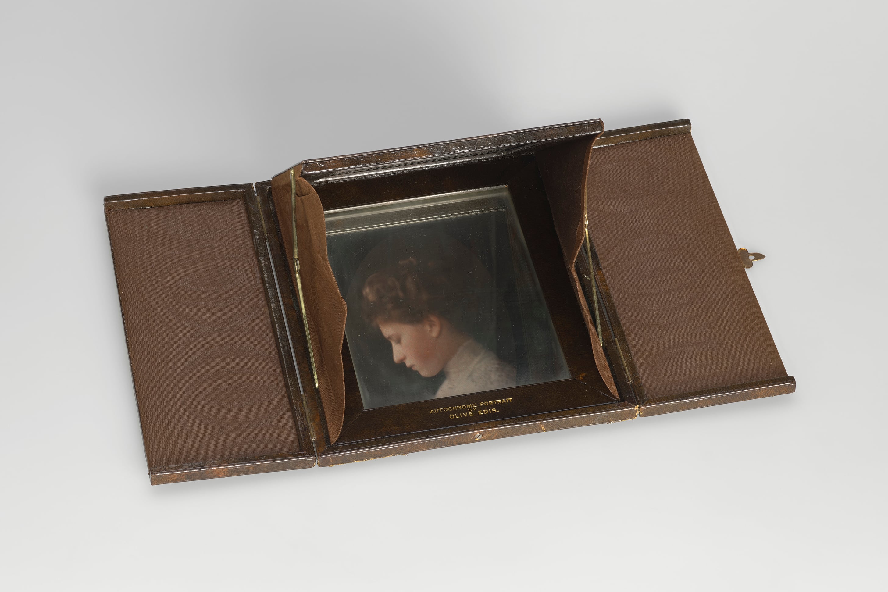 Olive Edis, Autochrome of Princess Mary, 1918 to 1920 (RCIN 2413110) A colour autochrome contained in a diascope (a protective holder) to be viewed with a mirror, a head and shoulders portrait of Princess Mary, in right profile, looking down; within oval.
