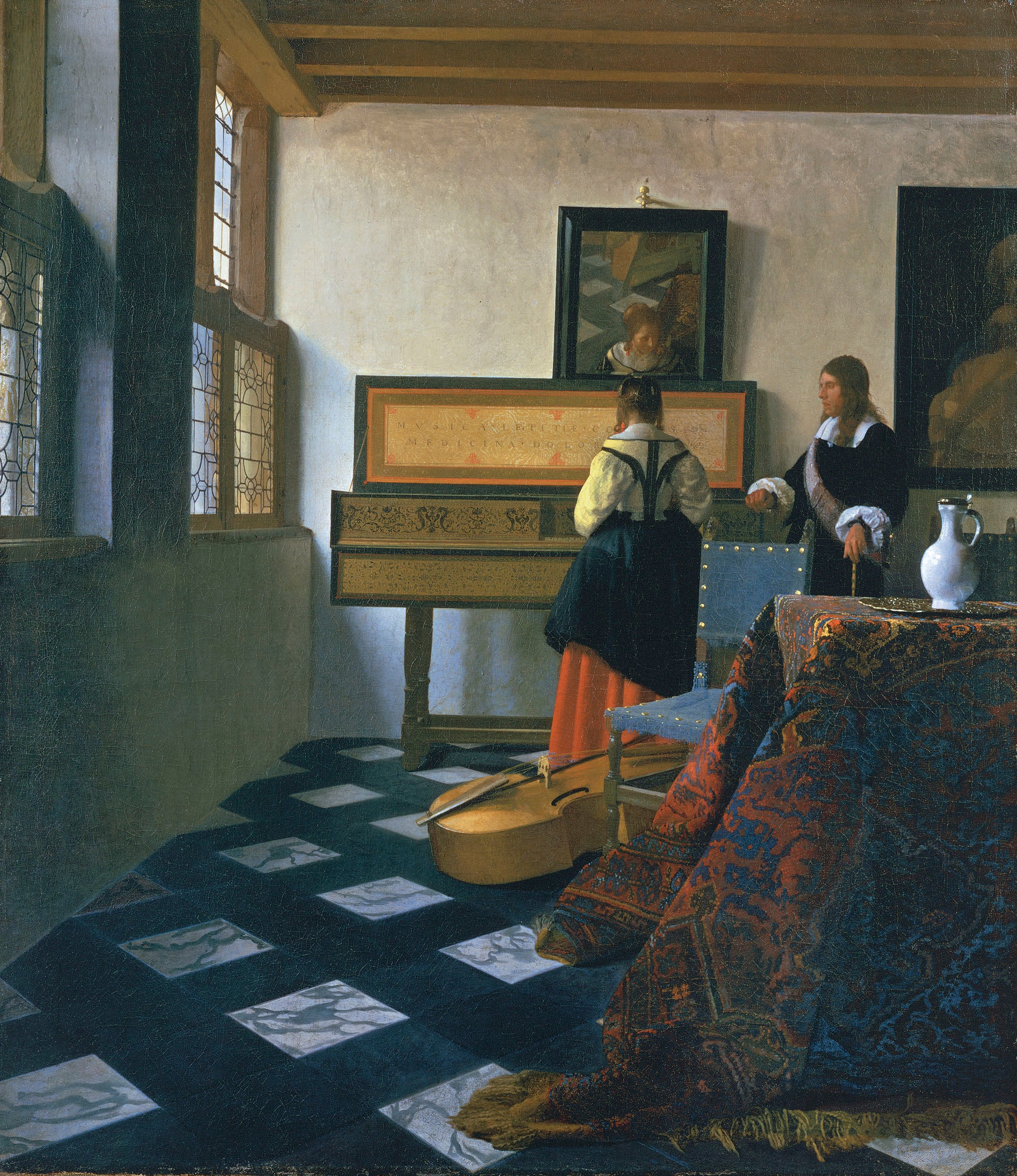 Johannes Vermeer, Lady at the Virginals with a Gentleman (RCIN 405346) A painting of a woman with her back to the viewer stands at the virginals; her head and shoulders are reflected in the mirror hanging above; a man stands watching her on the right.