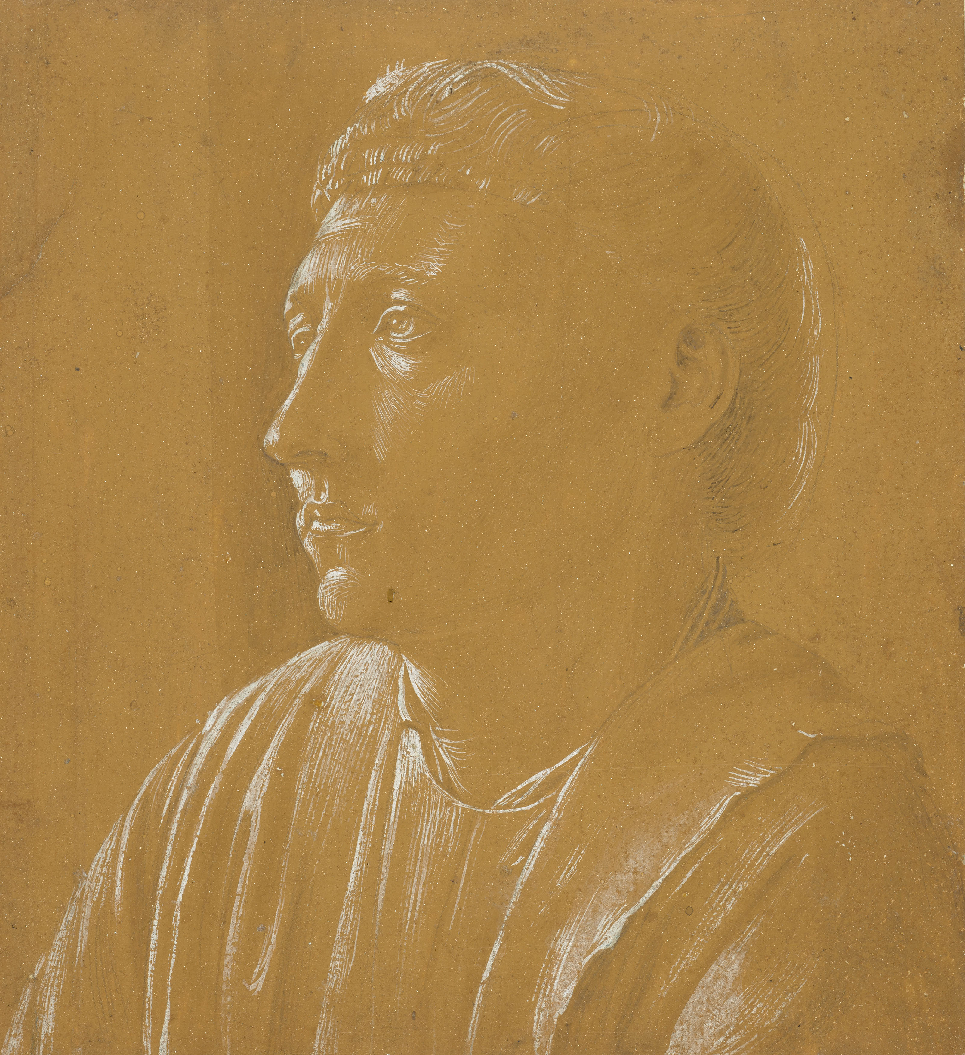 Drawing in white of a man's head on brown paper