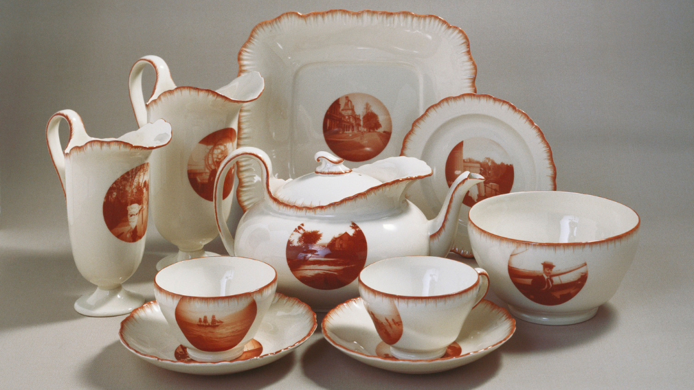 Brown-Westhead Moore & Co, Set of cups and saucers, 1891-92 (RCIN 53058) A set of pear-shaped porcelain cups with loop handles decorated with feather edging in sepia red and transfer-printed with photographs taken by Queen Alexandra when Princess of Wales.