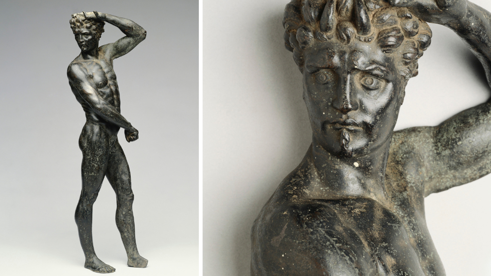 A bronze statuette of a naked satyr by Benvenuto Cellini. The full-length figure cast in three-quarter relief with a hollow back. The head with densely curled hair, horns to the forehead and beetled brow, turned sharply to his right. 