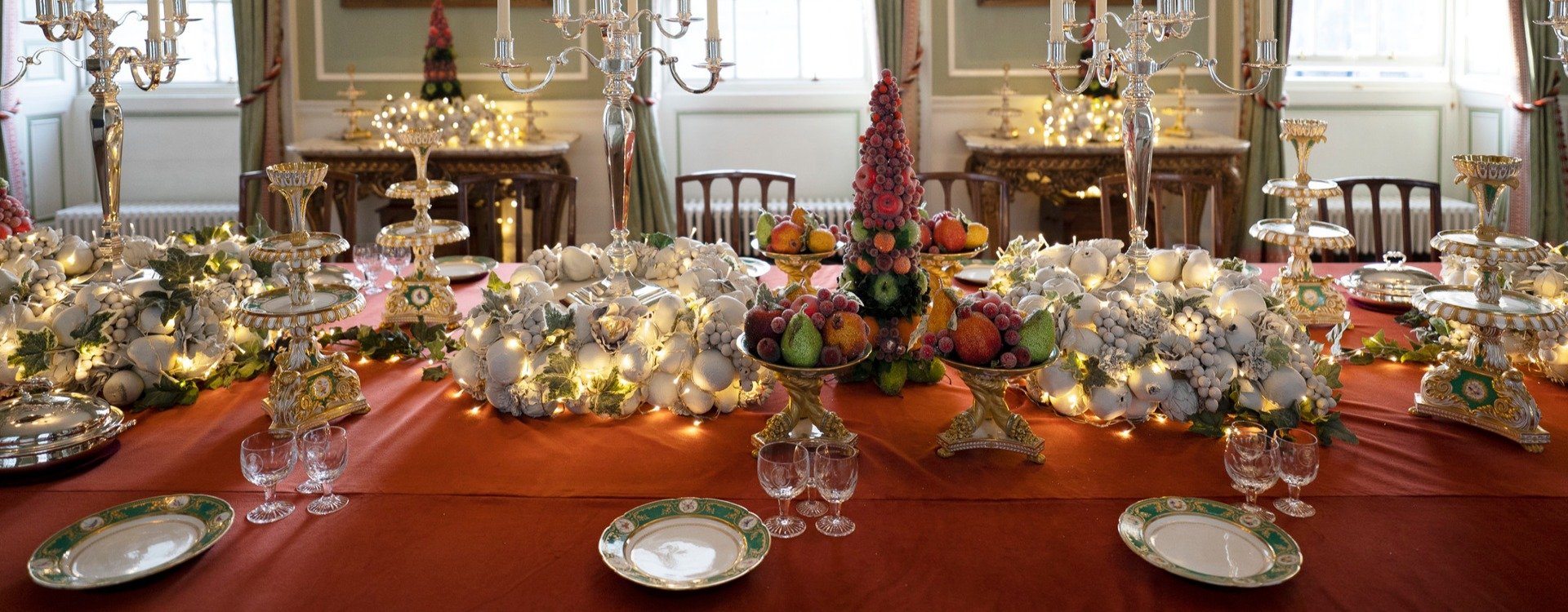 A dining table decorated for Christmas