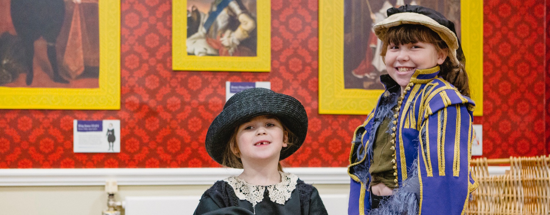 2 children wearing dressing up clothing