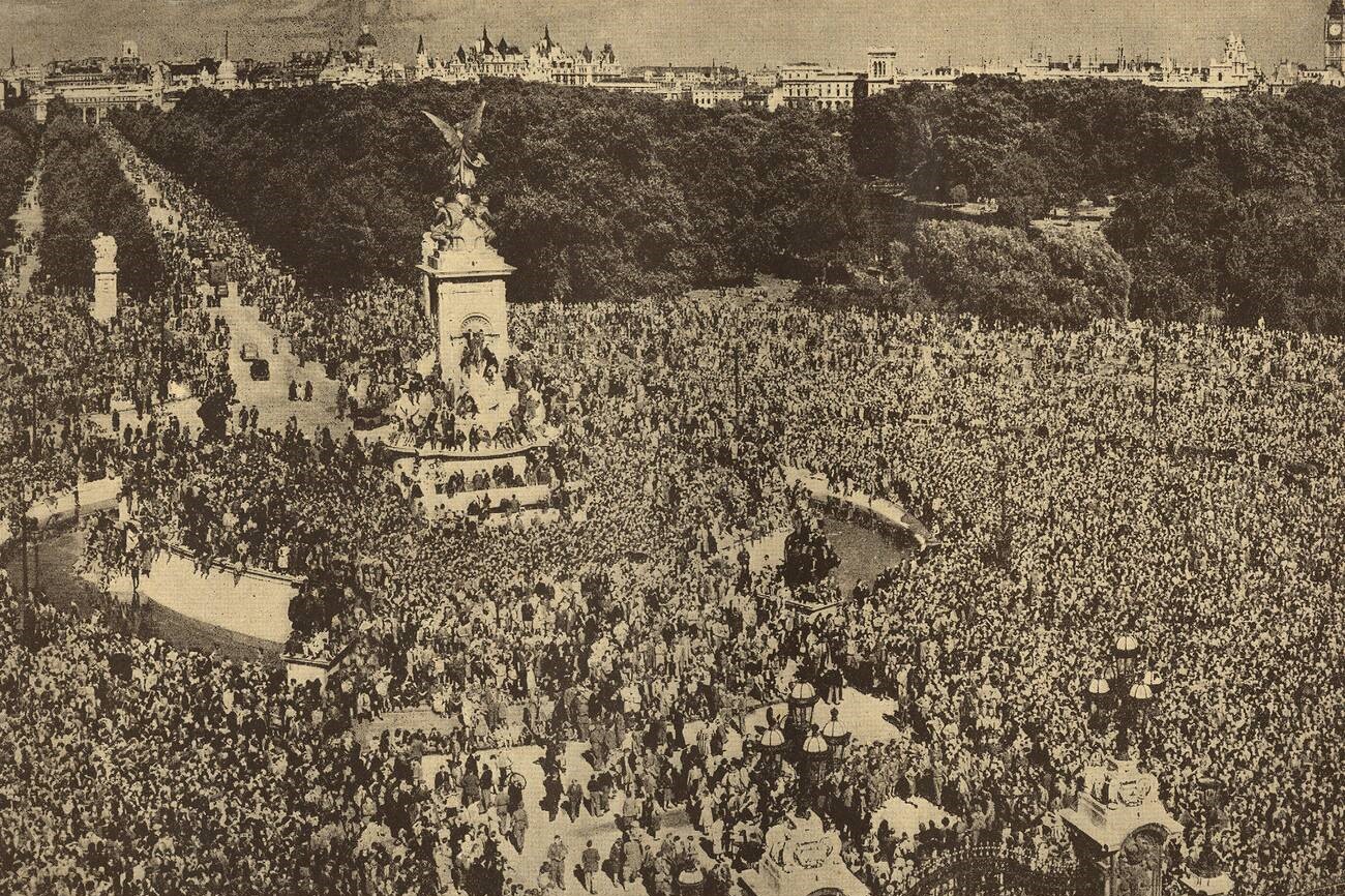 London crowds gather outside Buckingham Palace for VE Day celebrations in May 1945. A photograph of London crowds gather outside Buckingham Palace for VE Day celebrations in May 1945.