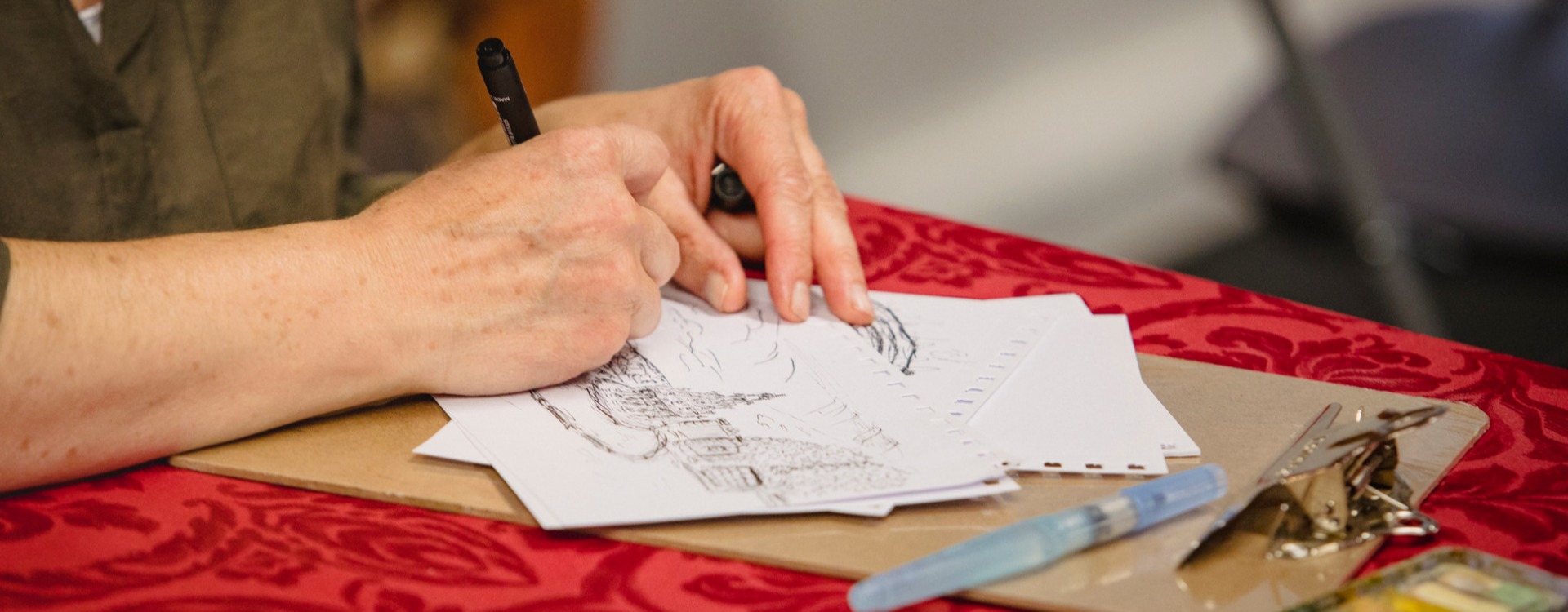 Edinburgh Sketcher A close up of a hand drawing on paper