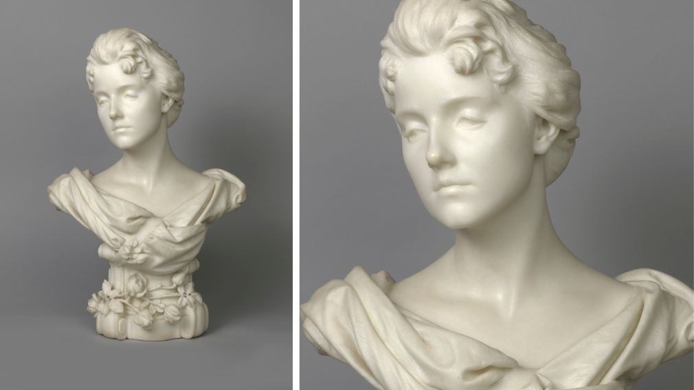 Marble bust of Lady Alice Montagu by Emil Fuchs, with her head turned and bent slightly to the left, wearing a loose dress gathered at the shoulders and a strap crossing at the front with a stemmed rose bud attached to it.