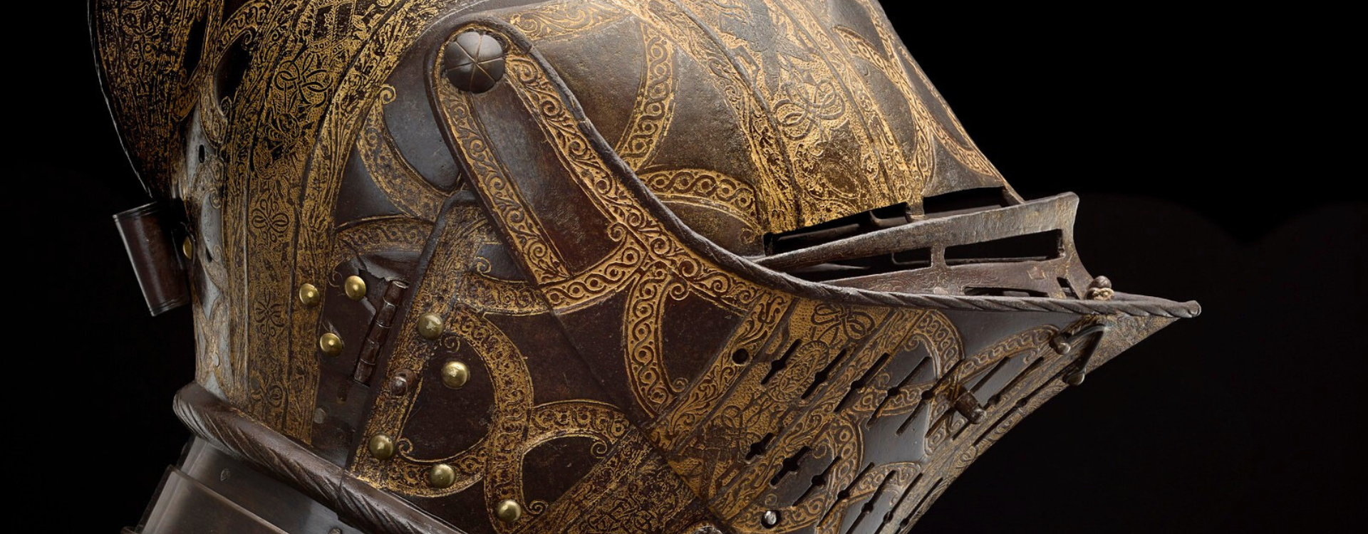 Jacob Halder, Armour garniture of Sir Christopher Hatton for the field, tourney, tilt and barriers, 1585 (RCIN 72835) Armour garniture for the field, tourney, tilt and barriers. Of blued and russeted steel, etched and gilt; decorated with vertical and diagonal bands, scrolls, military trophies, figures, strapwork and heraldic roses.