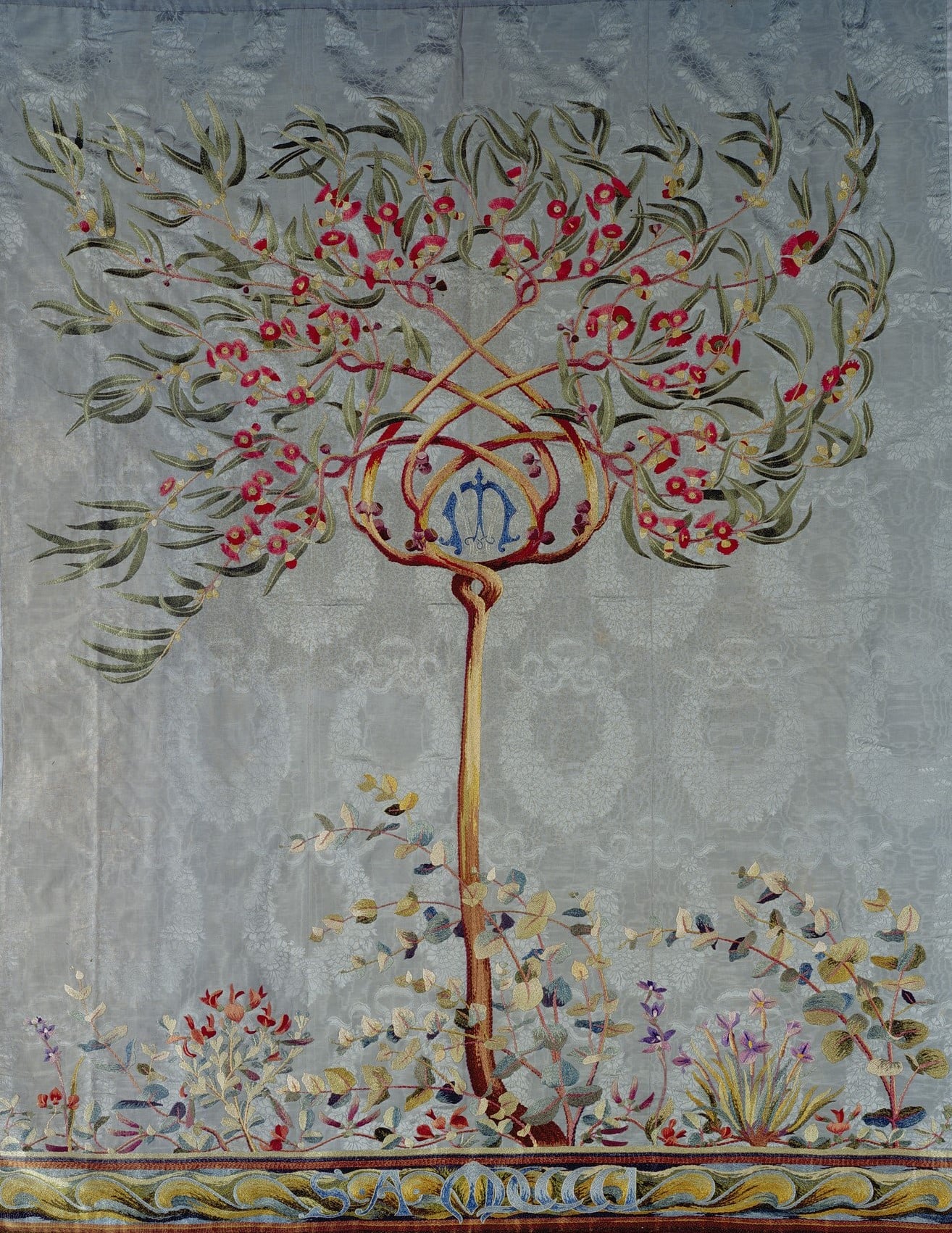 Adelaide School of Design, Portière 1901 (RCIN 21415) A silk portière embroidered with a eucalyptus (gum) tree with six flowering intertwined branches, and with Australian flowers at its root.
