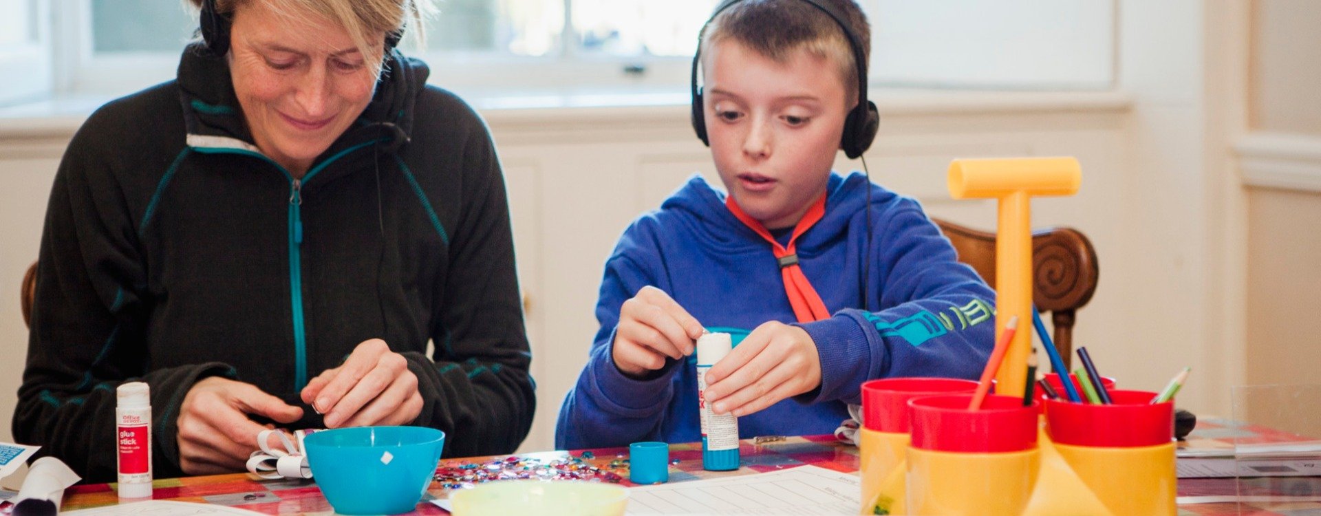 2 people taking part in craft activities