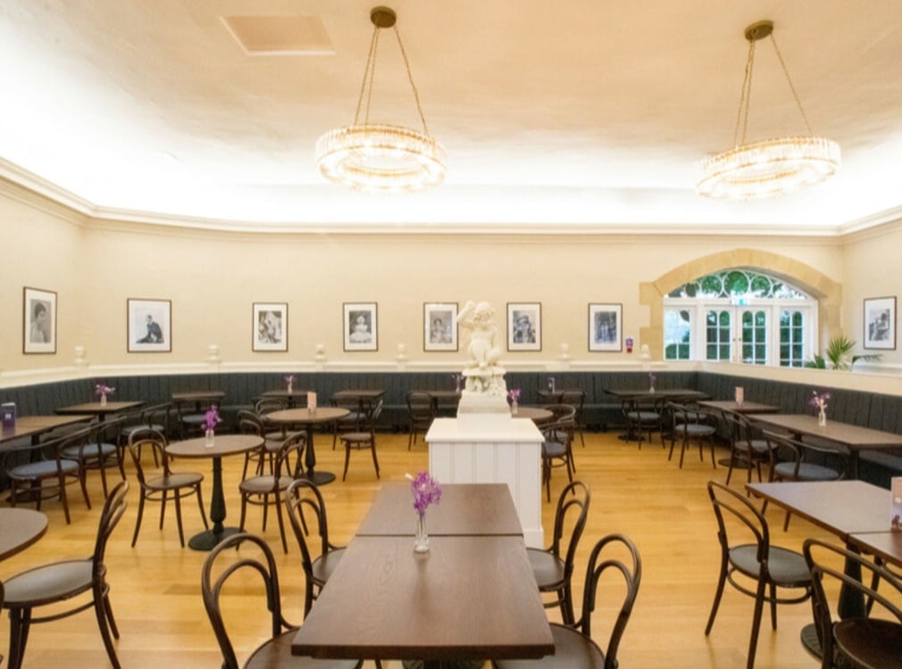 Interior view of cafe with chairs and tables