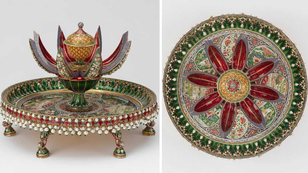 An enamelled gold perfume holder or attardan formed of a circular tray with a green and red enamelled gold lotus flower in the centre that opens to reveal a yellow and red cup and cover when pressure is applied to the rod beneath the tray. 