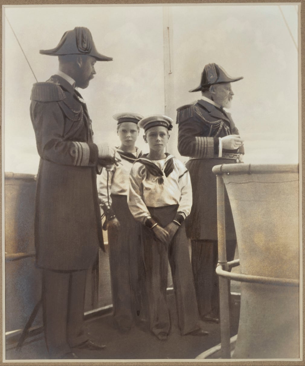 RCIN 500784 - Photograph showing full length portraits of King Edward VII, George, Prince of Wales, and Princes Edward and Albert of Wales in naval uniform, taken by Queen Alexandra Photograph showing full length portraits of King Edward VII, George, Prince of Wales, and Princes Edward and Albert of Wales in naval uniform