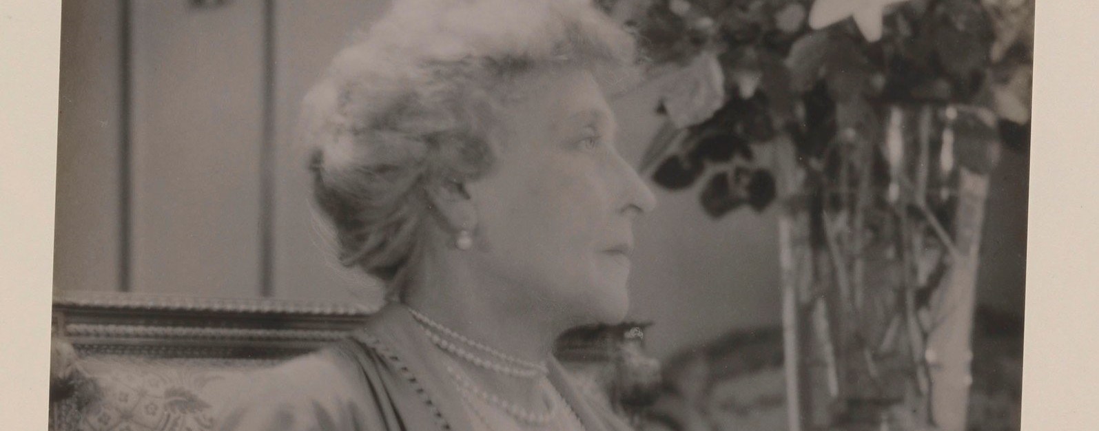 Black and white photograph of an older, well presented woman