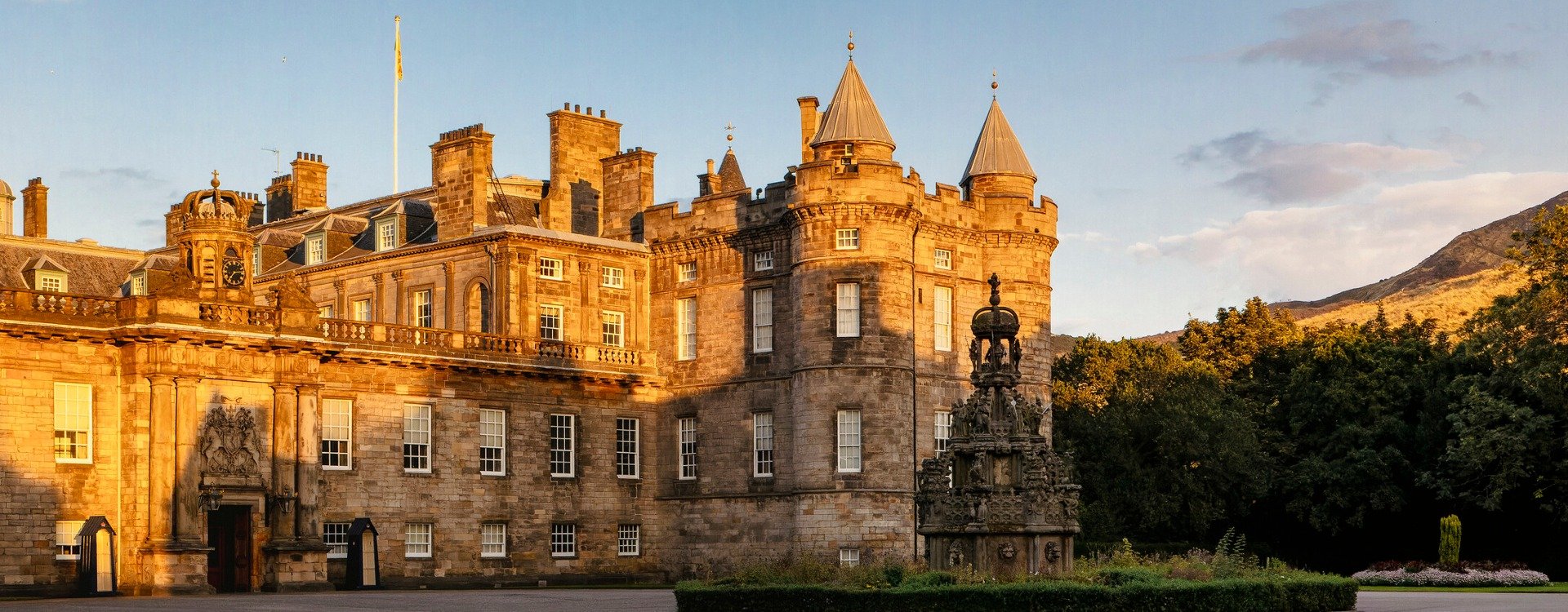 The front of the Palace of Holyroodhouse in partial shade and evening sunlight