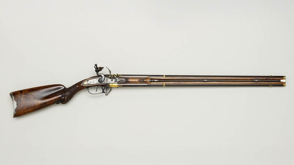 Lepage: Paris, Sporting gun, 1780 - 1820 (RCIN 61154) A double barrel over-and-under flintlock sporting gun; browned barrels, the top rifled, the lower smooth bore.