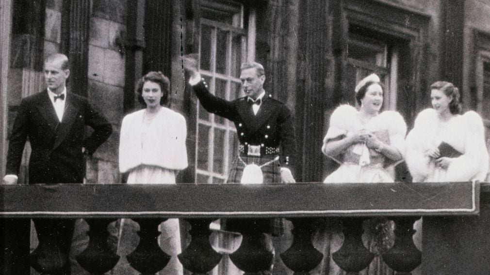 George VI, Queen Elizabeth, Princess Margaret, Princess Elizabeth and Lieutenant Philip Mountbatten on the Palace roof, 1947 (RCIN 2850616) Black and white photograph of George VI, Queen Elizabeth, Princess Margaret, Princess Elizabeth and Lieutenant Philip Mountbatten on the Palace of Holyroodhouse roof