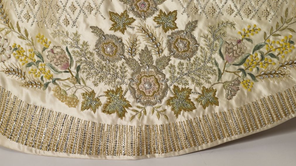 The embroidery on the edge of the skirt Coronation dress detail