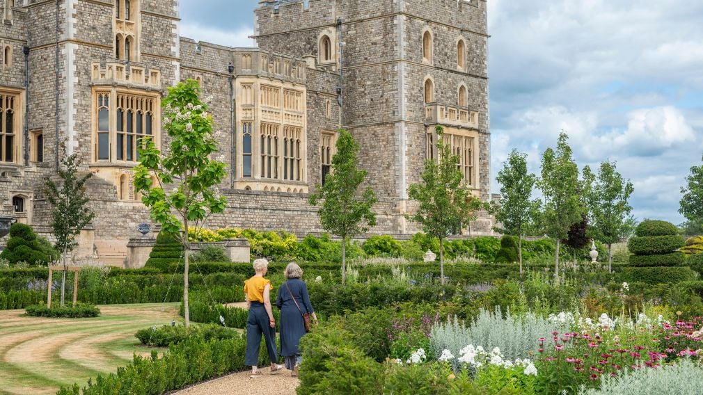 Visitors stroll through the Venus Garden at Windsor Castle, which is included as part of your standard visit during the summer