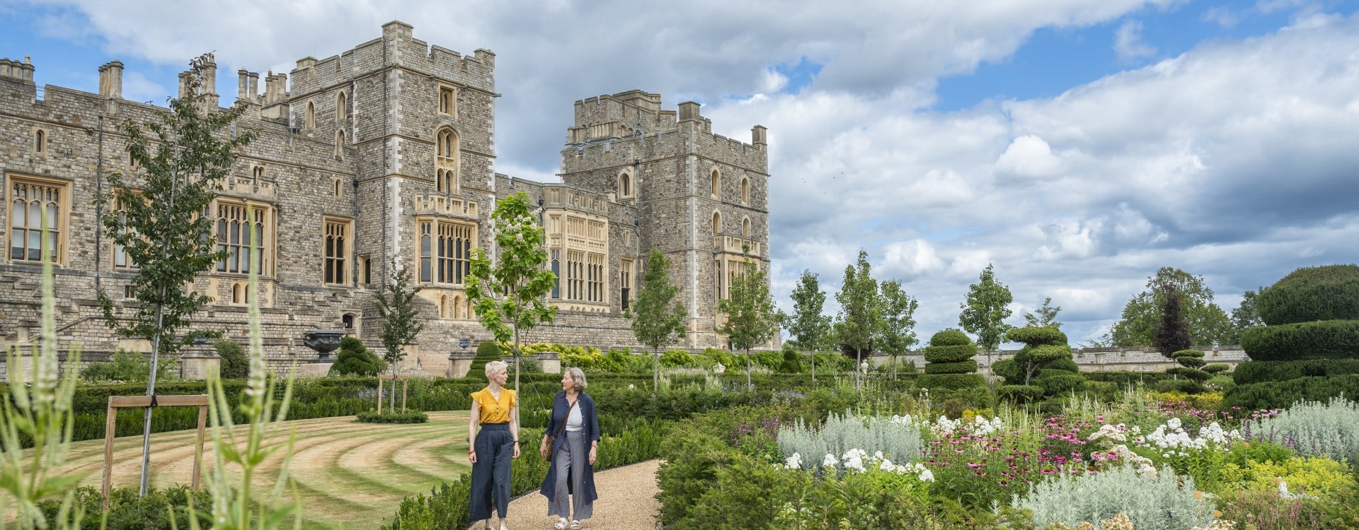 Visitors stroll through the Venus Garden at Windsor Castle, which is included as part of your standard visit during the summer